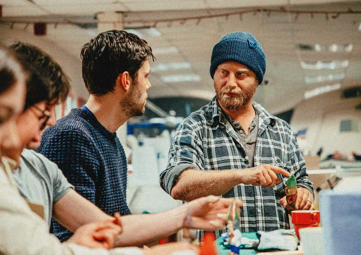 edinburgh-open-workshop-text-slider-1 Two people discuss project in workshop