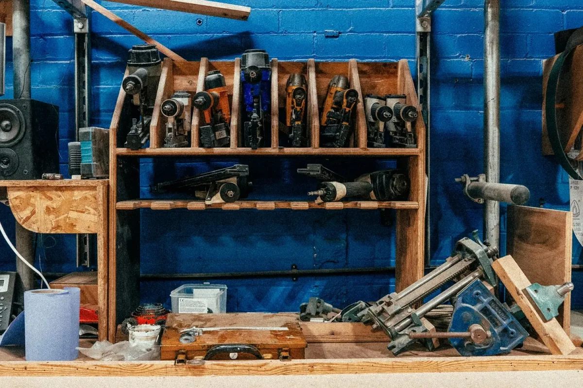 edinburgh-open-workshop-text-slider-2 Shelf of various workshop power tools