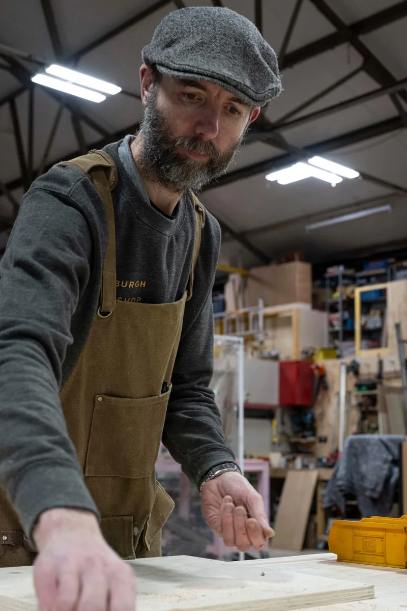 Person working in woodwork area