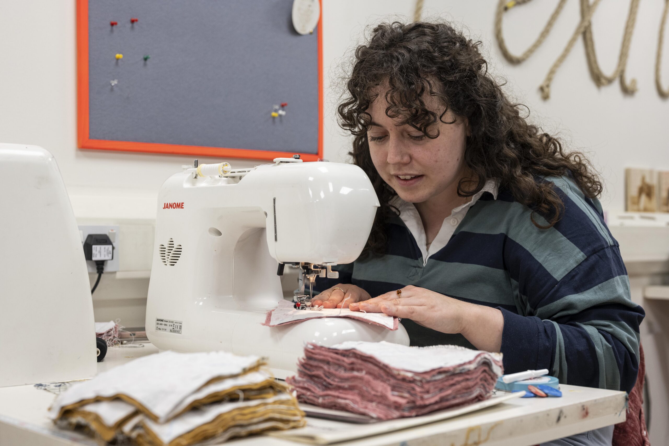 Textile member using sewing equipment in EOW’s dedicated textiles room