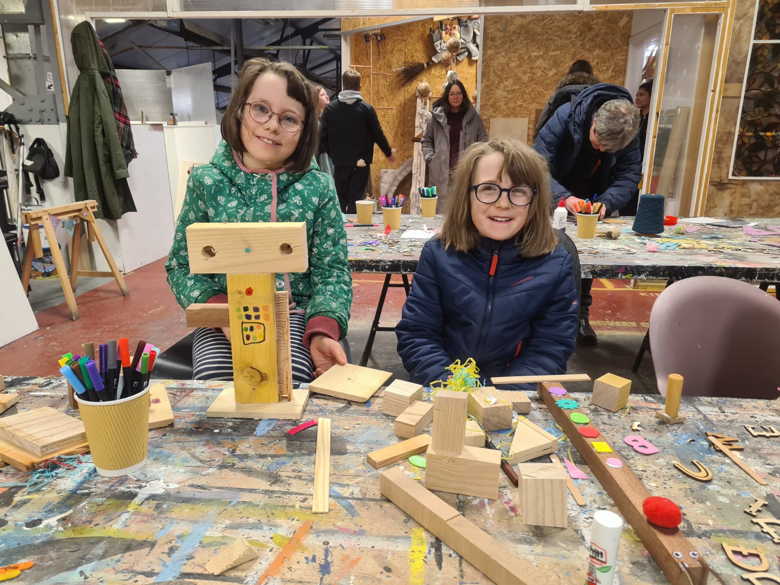 Children making models from bits and bobs during the Festive Makers Market