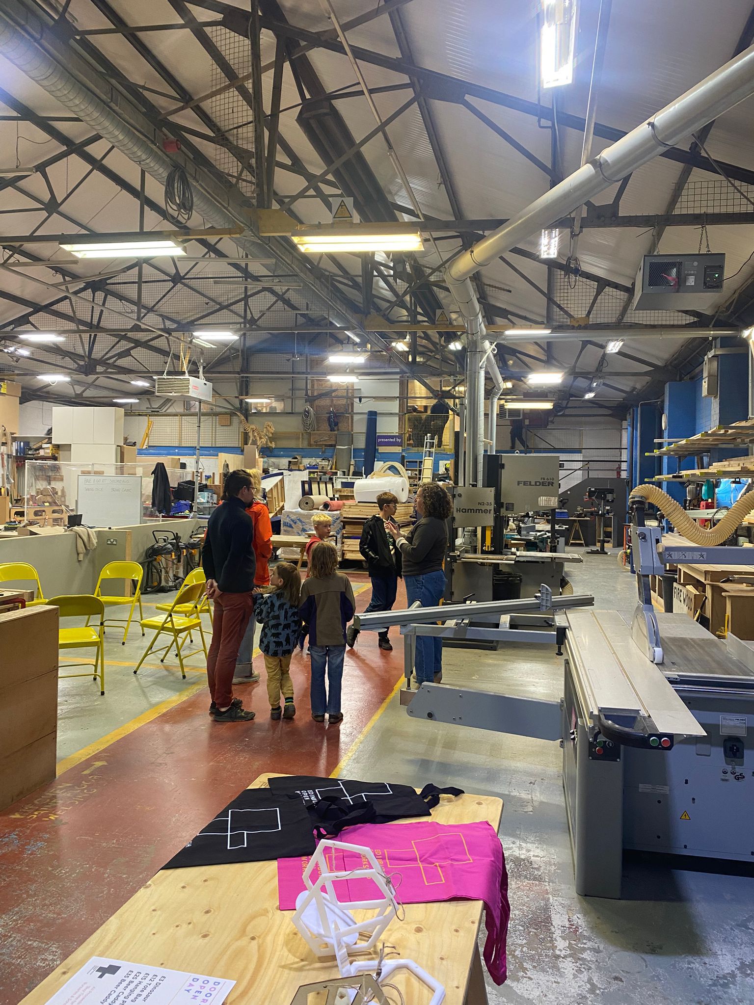 Group of visitors on a tour of the workshop