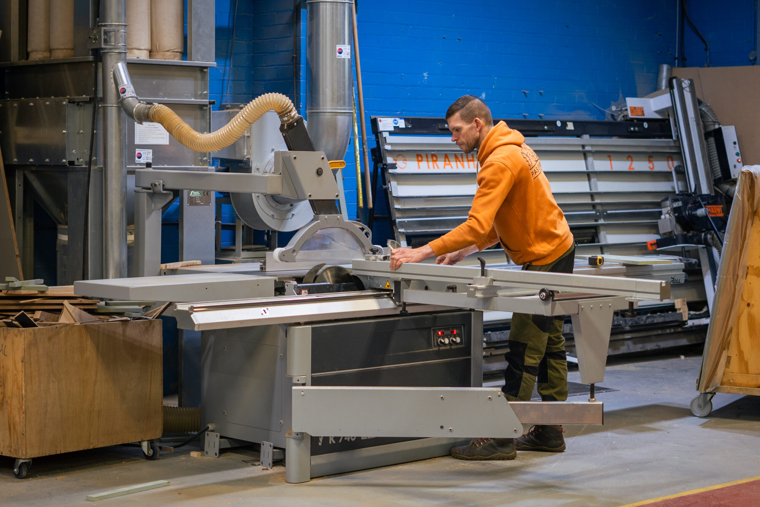 Resident Maker at a woodworking machine