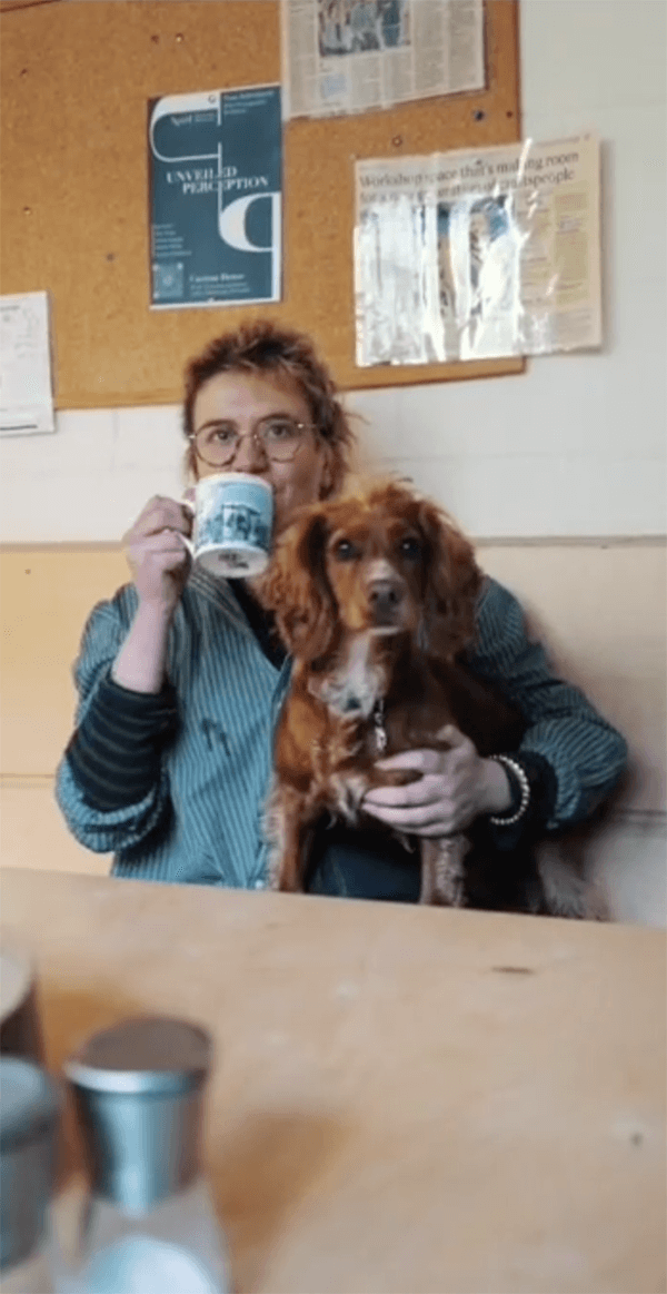 kitchen-poster-image Rosie and a cute dog sit in the kitchen